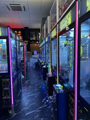Colorful Hong Kong arcade lights at night