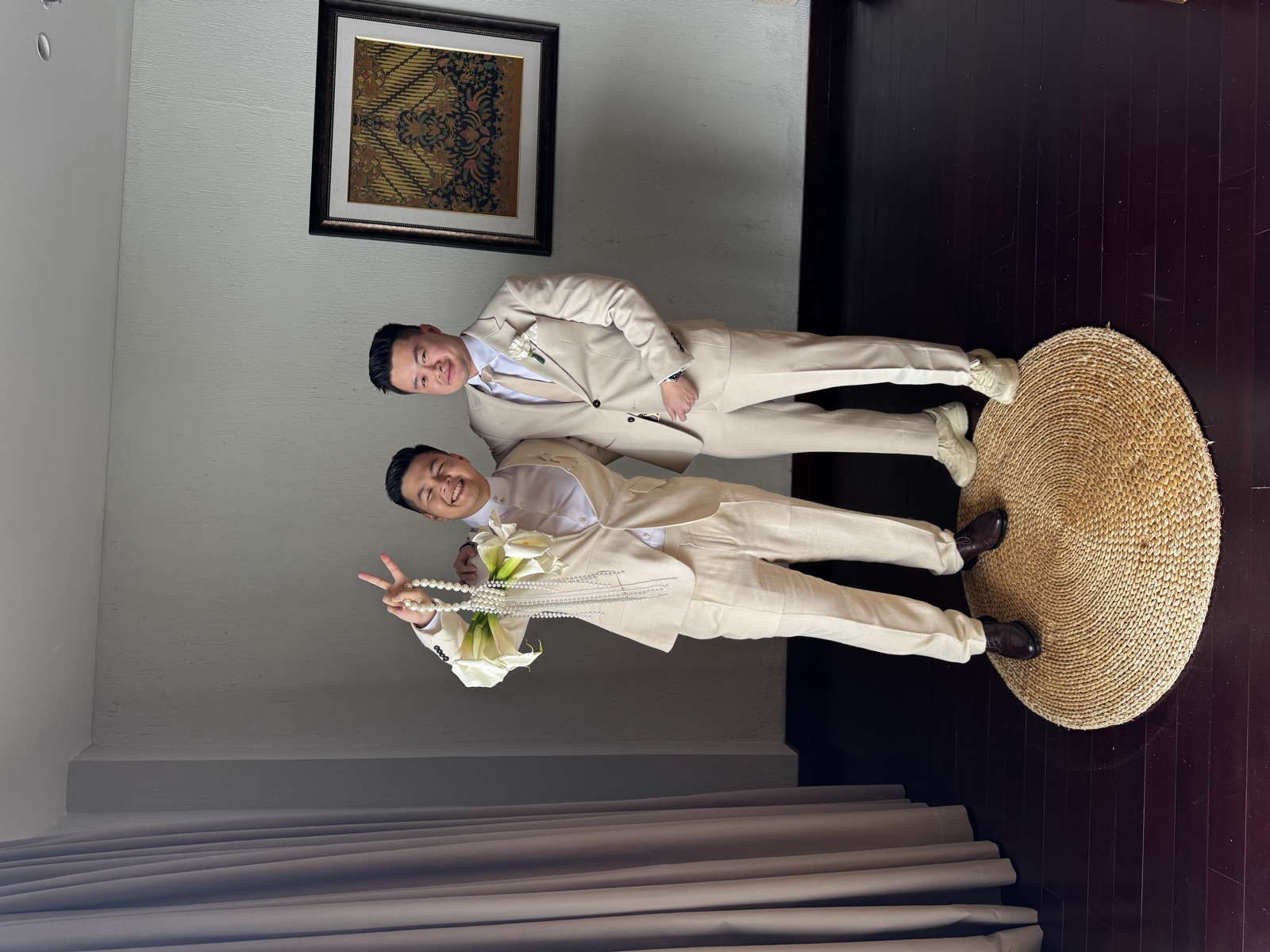 Two brothers posing together before the ceremony