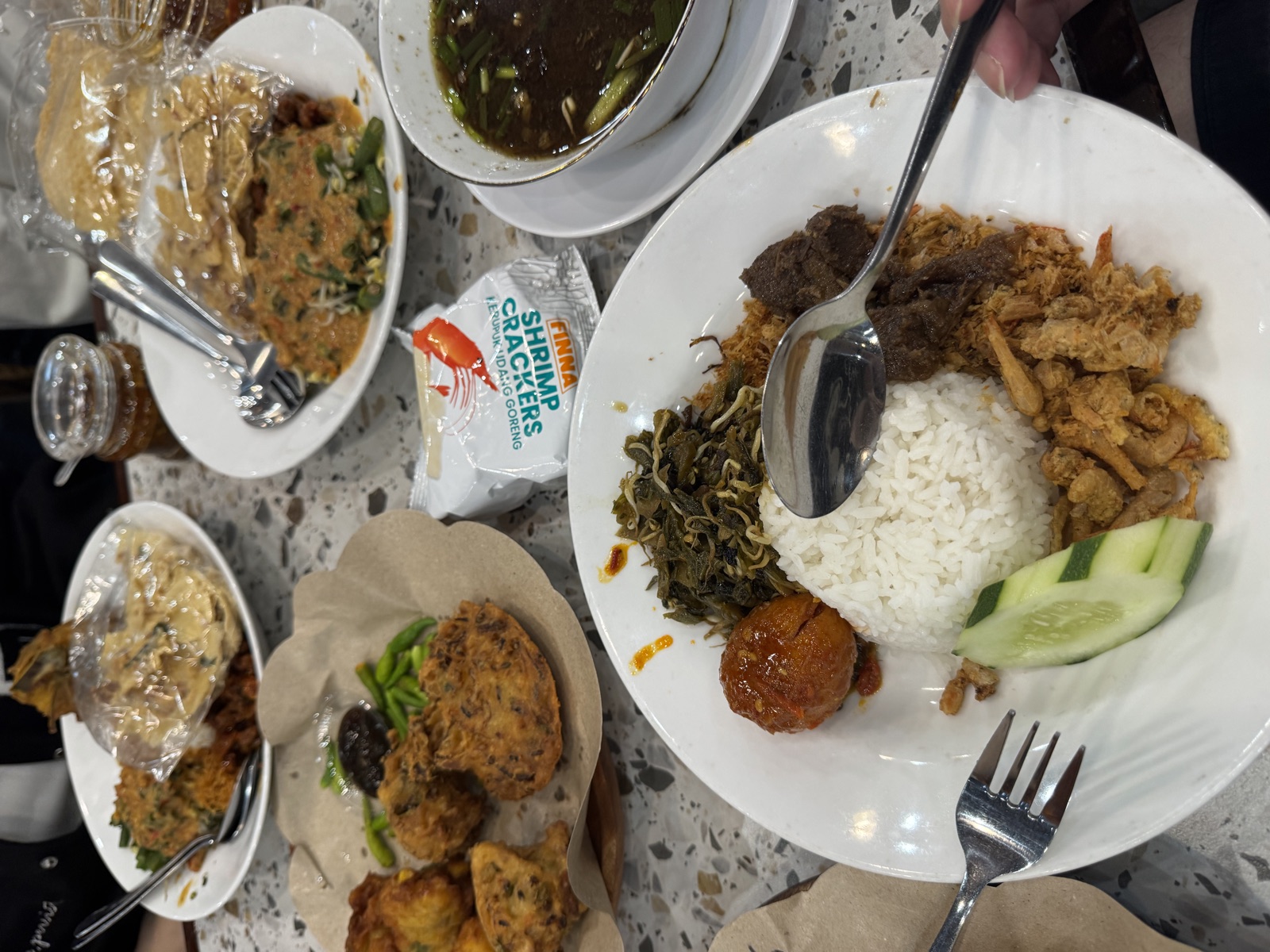 Simple East Java family meal on a table before the wedding weekend