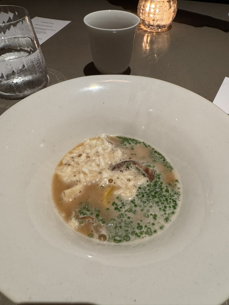 Light green sorbet dessert with jelly and zest