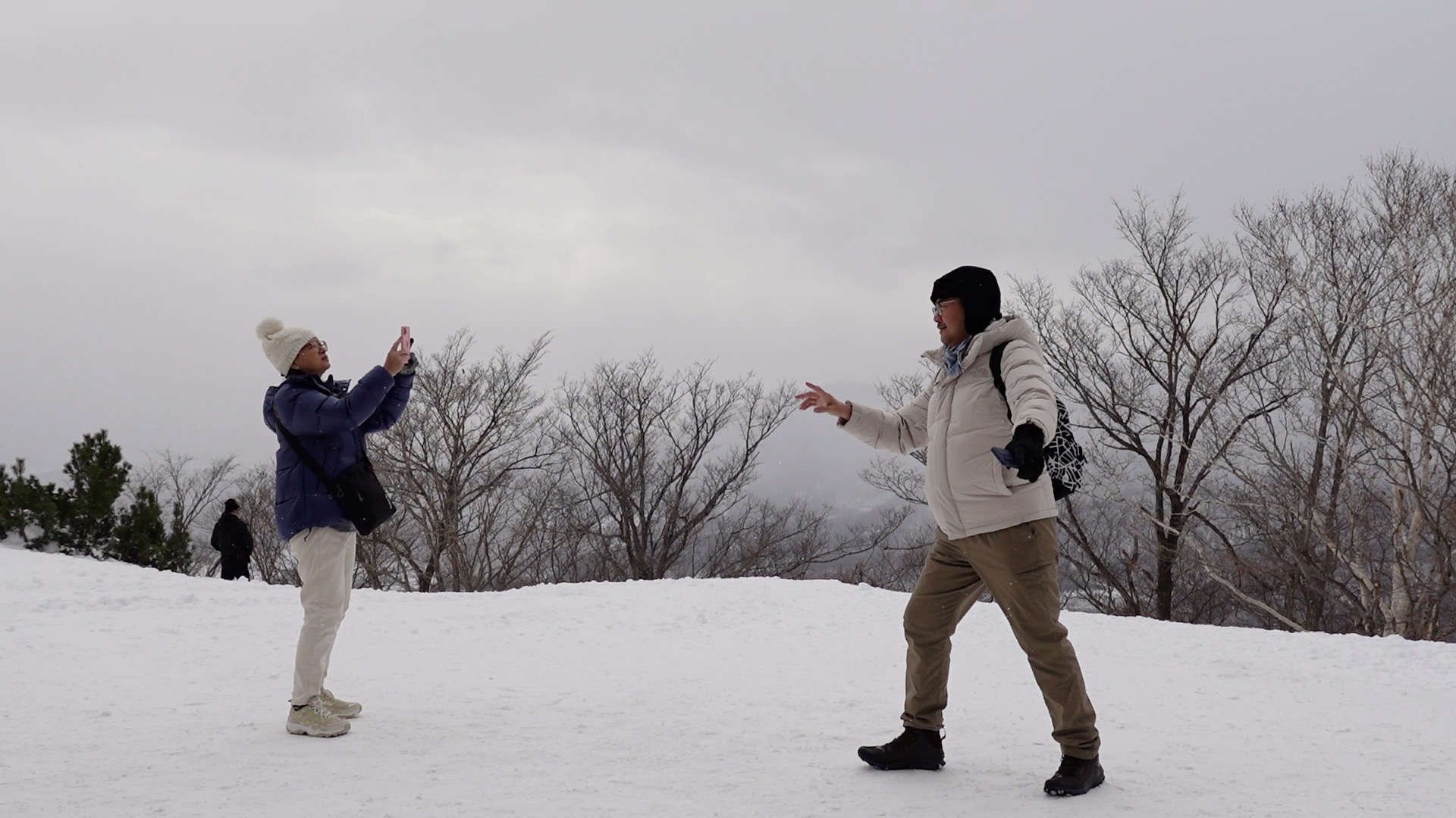 Taking a photo in the snow at Mt. Moiwa