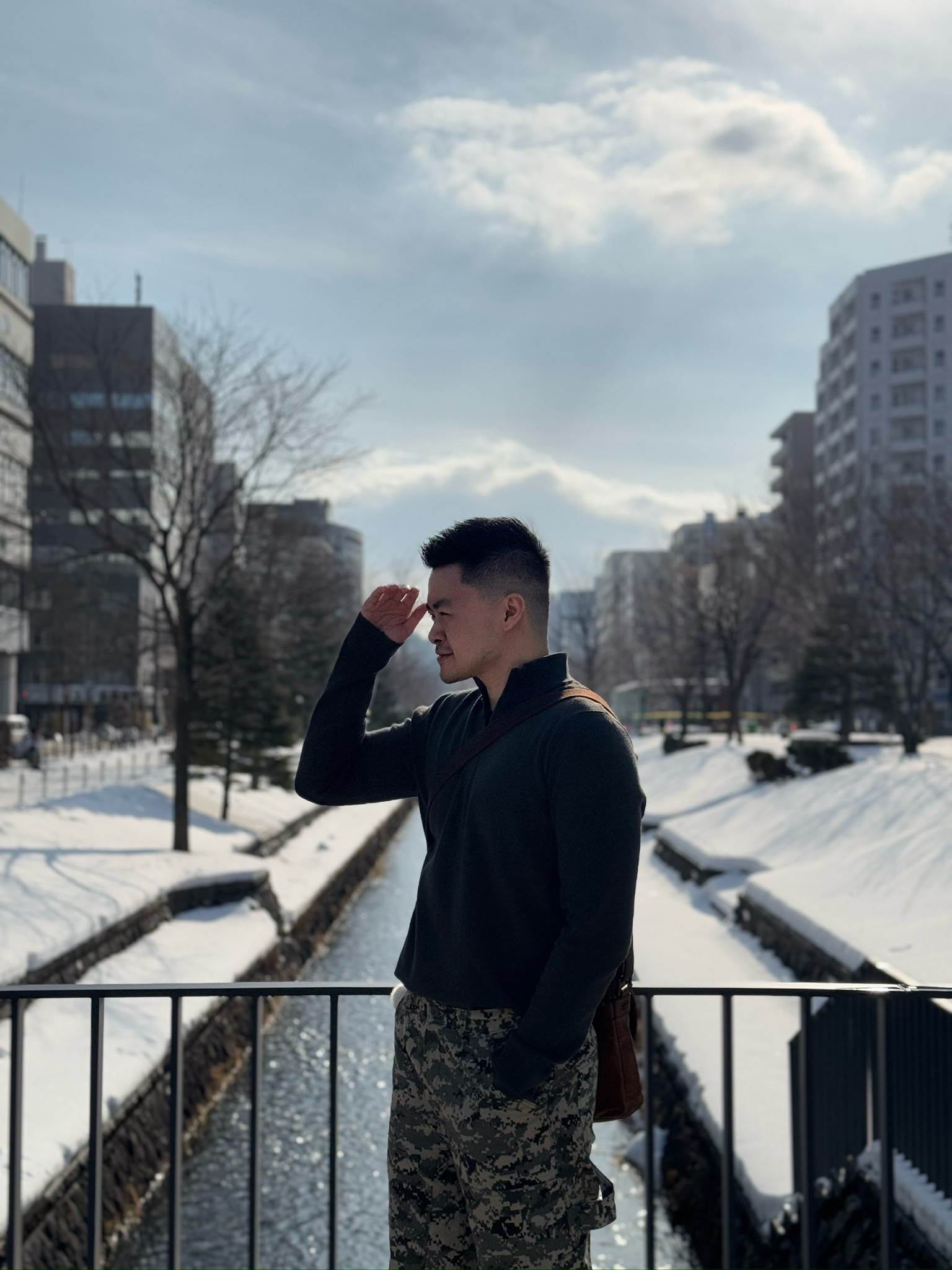 Portrait by the snowy canal near Odori Park