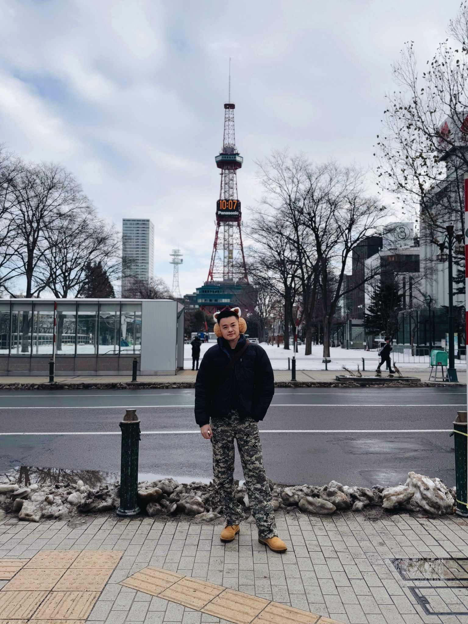 Portrait with Sapporo TV Tower in the background at Odori Park