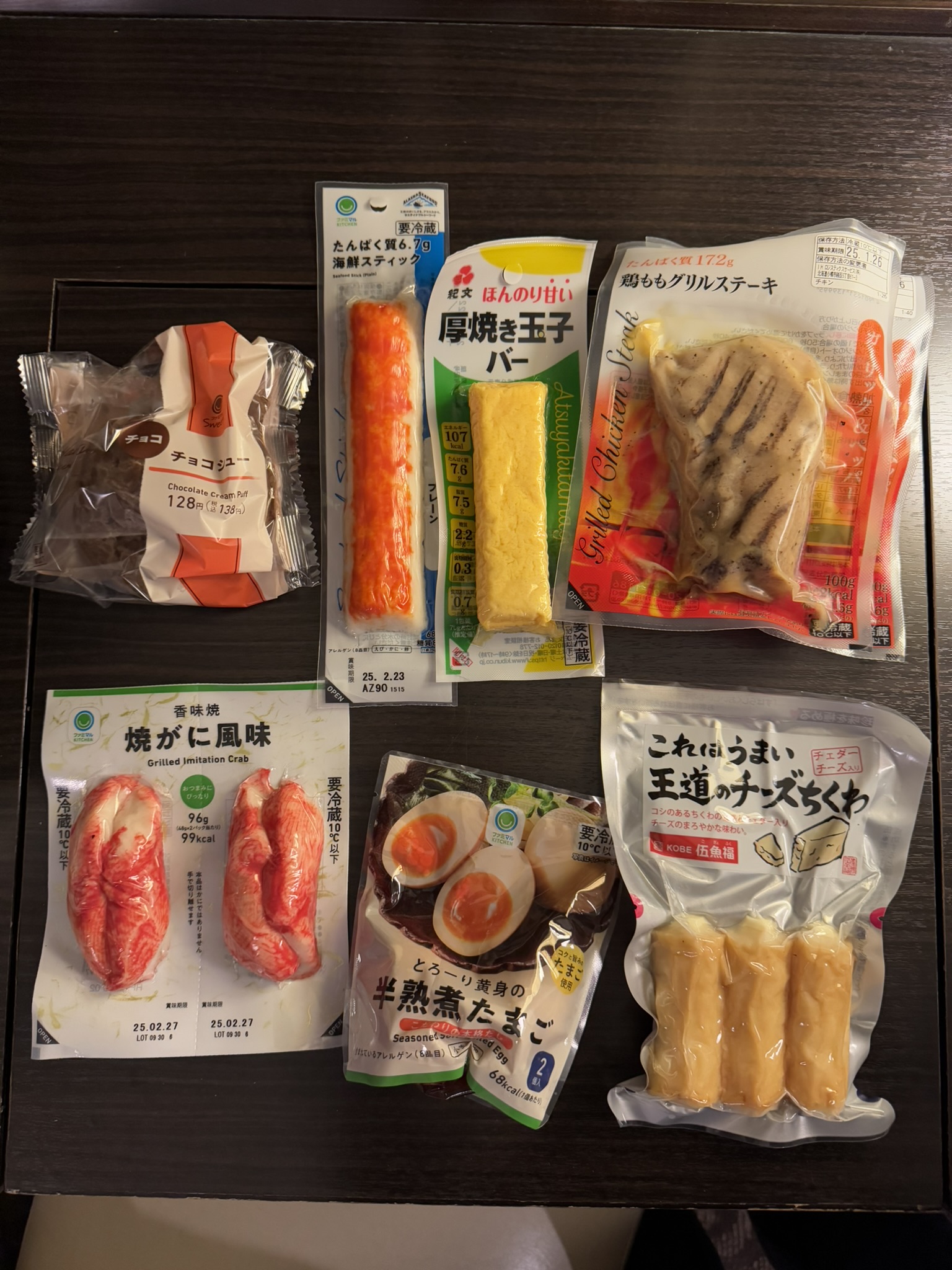 7-Eleven dinner spread with crab, egg, grilled chicken, and snacks
