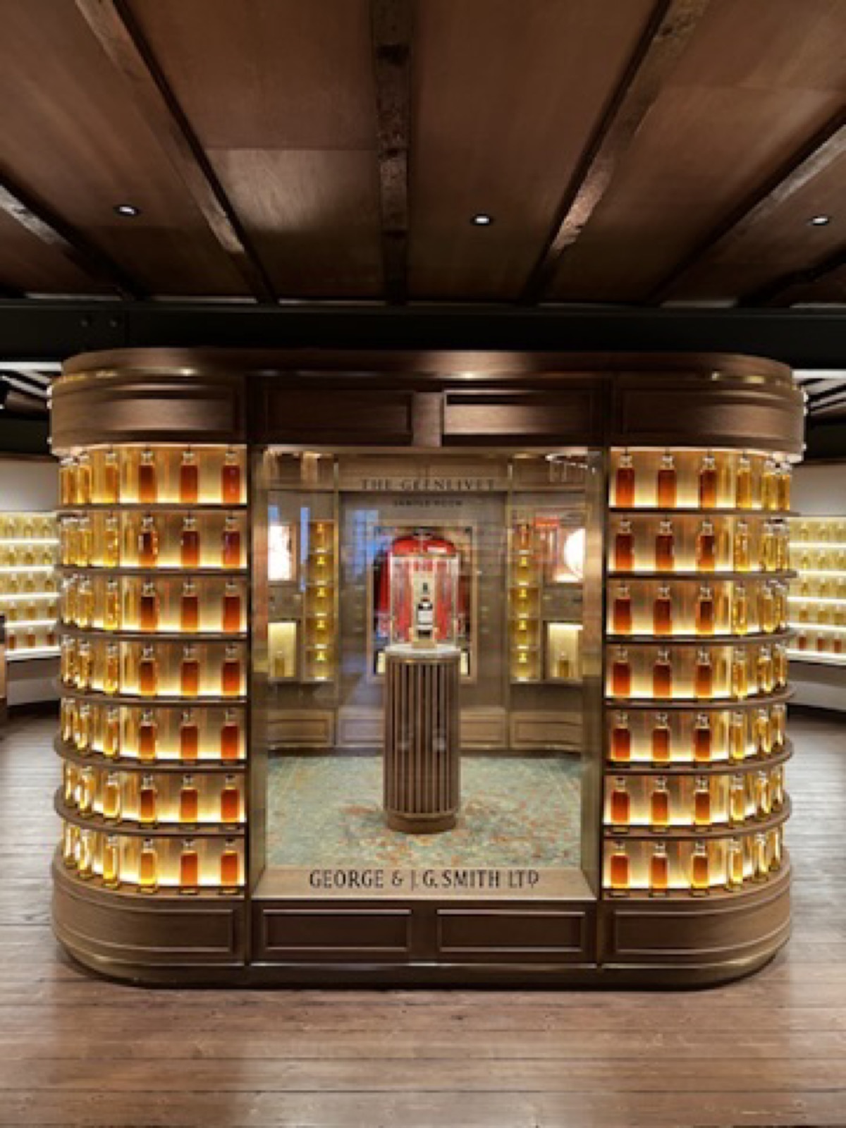 Bottle and barrel display in a whisky room